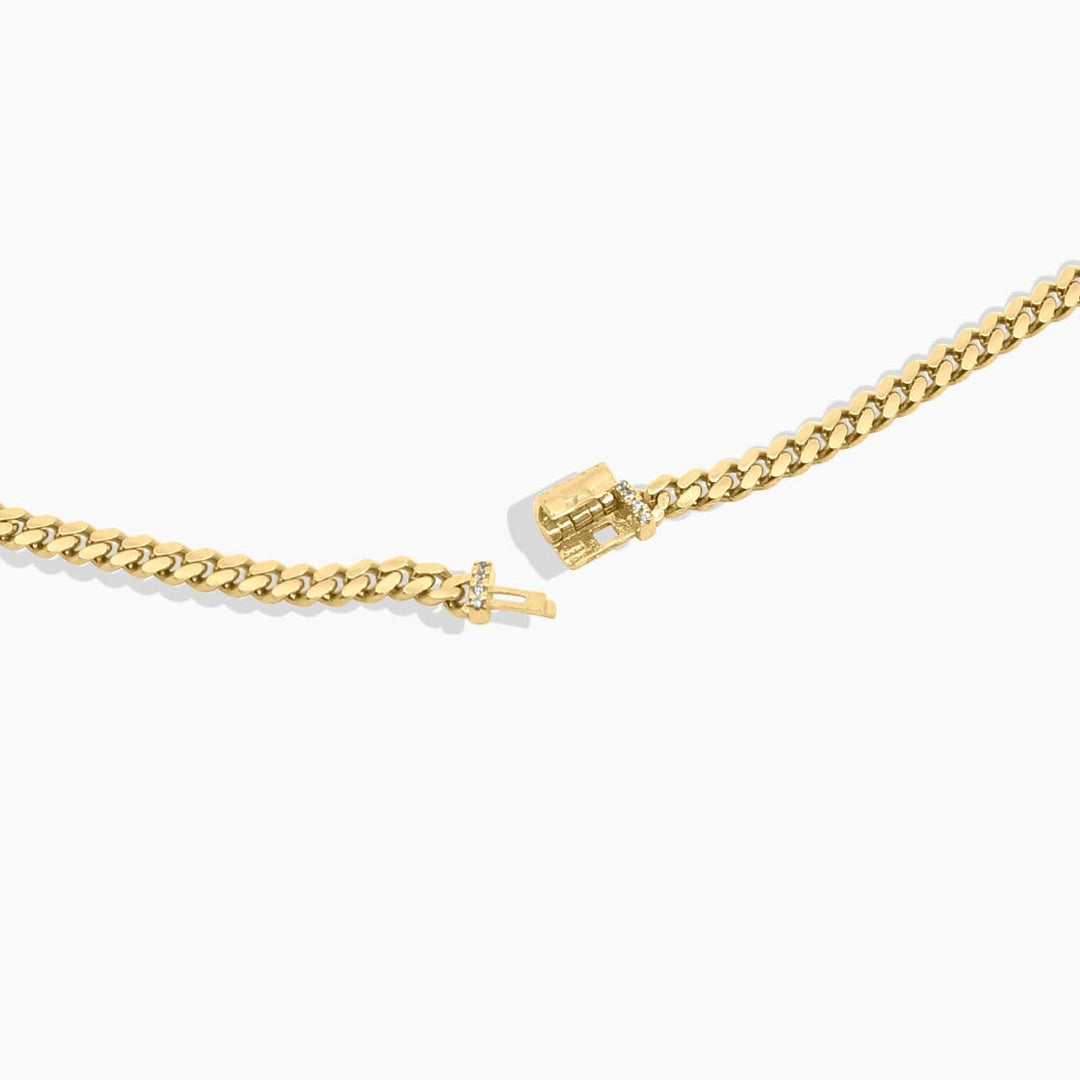 Pulsera Cubana en Oro 10K con Cierre de Piedras Daisy Joyeria